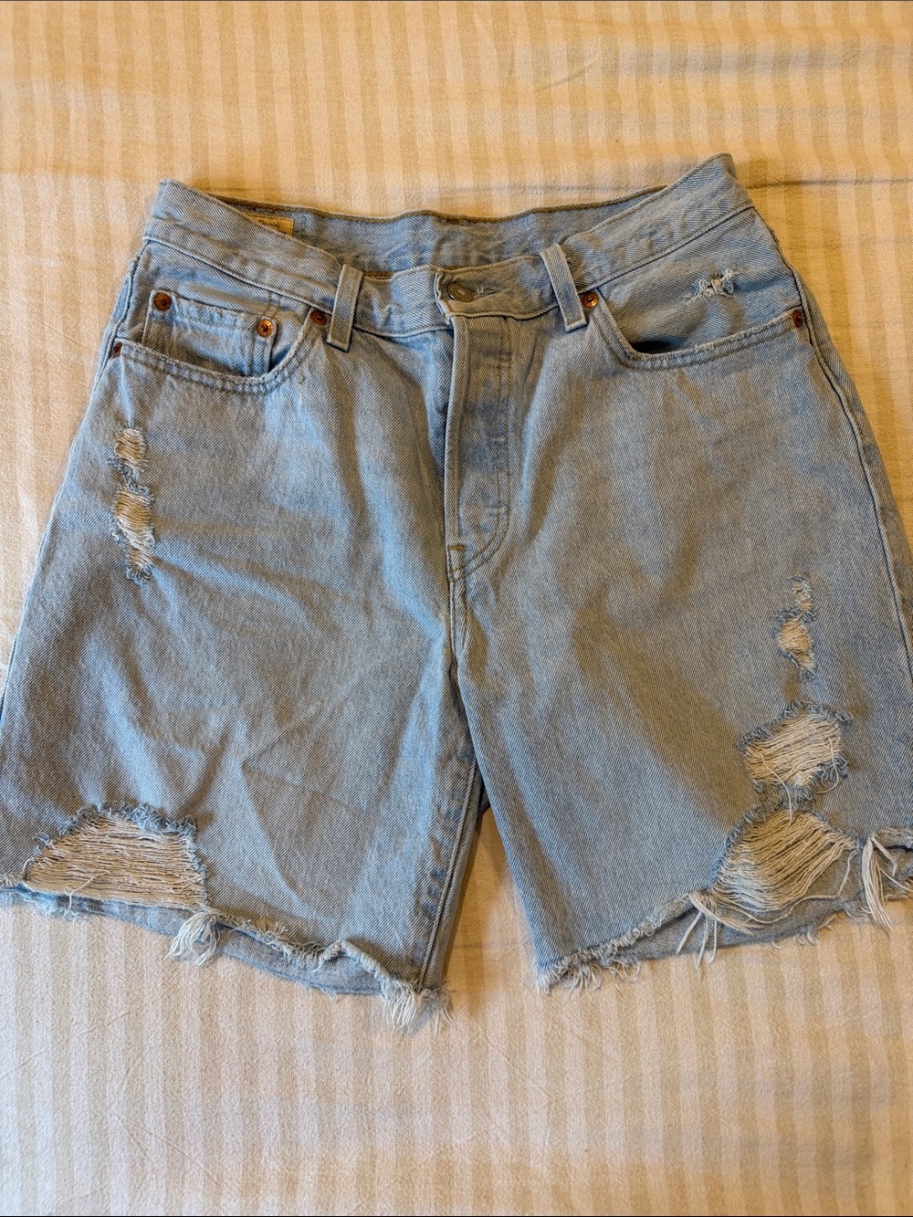Levi 501’s Light Blue Distressed Denim Shorts